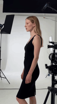 AI generated video: <Subject 1> is the young woman with long blonde hair and a black sleeveless…