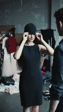 AI generated video: A humble elegant woman in elegant dress with wig cap hiding up all of her hair…