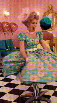 AI generated video: Like this but no bearded man in the chairs just the two ladies