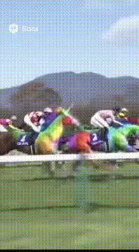 AI generated video: 有馬記念の競馬の動画。 全ての馬が虹色の毛並みのユニコーンです。 ゴールする白熱した瞬間を動画にしてください。