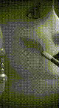 AI generated video: 1940s black-and-white film noir style, grainy 35mm celluloid texture, soft…