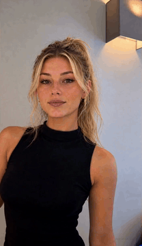 Видео, сгенерированное нейросетью: mila_v1, a blonde adult woman with softly defined facial features, natural skin…