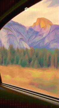 AI generated video: Looking out a car window at the mountains passing by, Yosemite. Smooth soft…