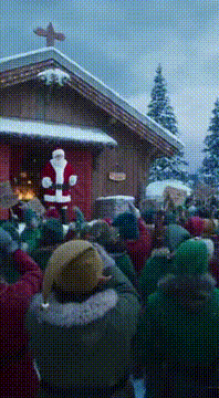 AI generated video: A massive group of elves in the North Pole are outside Santa's Workshop, and…