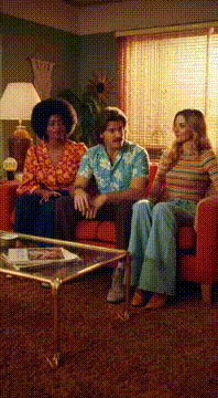AI generated video: 1970s sitcom. two women and one man share an apartment in California. The man…