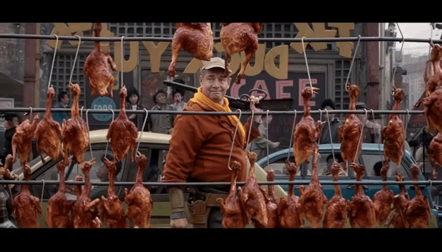 Видео, сгенерированное нейросетью: A lone surveyor stands firm beneath hanging roasted birds, his cap adjusting…