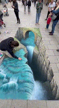 AI generated video: A street artist creating a massive chalk drawing on pavement, aerial view shows…