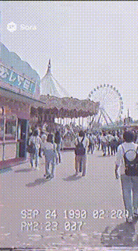 AI generated video: Realistic handheld VHS camcorder footage in late 1990s Japan, midday at a busy…
