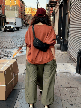 AI generated video: integrated_multimodal_description: [Shot 1] Live-action handheld street…