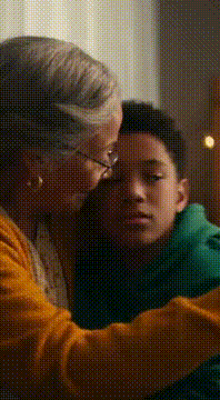 AI generated video: Grandma hugging her grandson and give advice