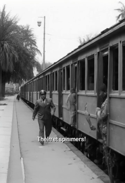 AI generated video: (The uniformed, weather-beaten Arab train conductor in the old, completely…