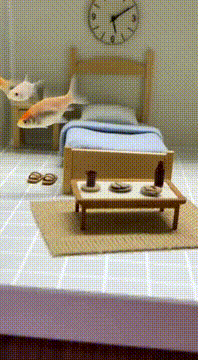AI generated video: A realistic homemade aquarium designed like a tiny human room, filmed casually…
