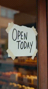 AI generated video: プロンプト 街中のケーキ屋。 ガラス窓に 「OPEN TODAY」 と英語で書かれた張り紙。 店内では 多くのお客がケーキを買い、…