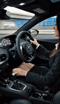 AI generated video: drive a Emira