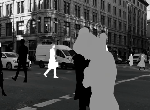 AI generated video: SHOT 1 — 0 to 2 seconds: A busy monochrome city street filled with black and…