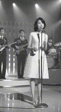 AI generated video: A stylish 1960s-era Japanese television variety show filmed in crisp black and…