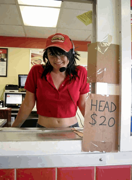 AI generated video: A pretty woman behind the drive through window at a fast food restaurant. The…