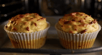 AI generated video: two muffins in an oven. one muffin looks to the other muffin and says, "fuck…