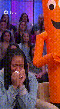 AI generated video: 0:00 – 0:05 — Daytime-TV studio. A tense audience leans forward. Onstage, a…