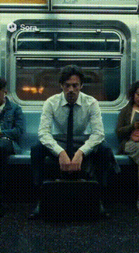 AI generated video: A tired office worker sits on a subway bench at night. Suddenly, the lights…